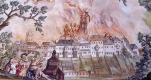 Der Brand von 1704 nach einer Darstellung des Trostberger Malers Franz Joseph Soll (Deckenfresko der Pfarrkirche Siegsdorf, 1781). © Stadtarchiv Traunstein