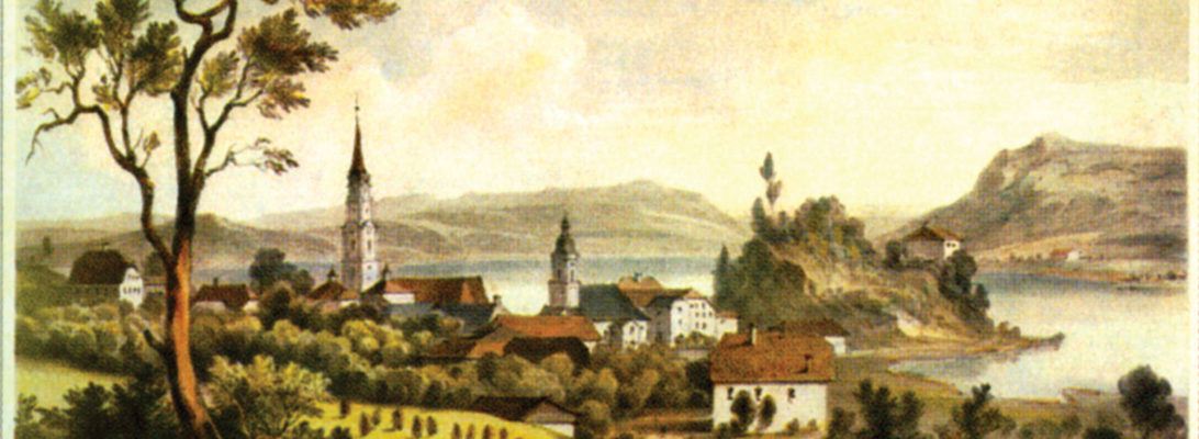 Mattsee mit der Stiftskirche (li.), dem Stift und der Pfarrkirche. Lithographie von Georg Pezolt 1845. © H. Dopsch